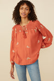 HY8822 Rust Womens Ditsy Embroidered Smock Detail Tassel Top Front